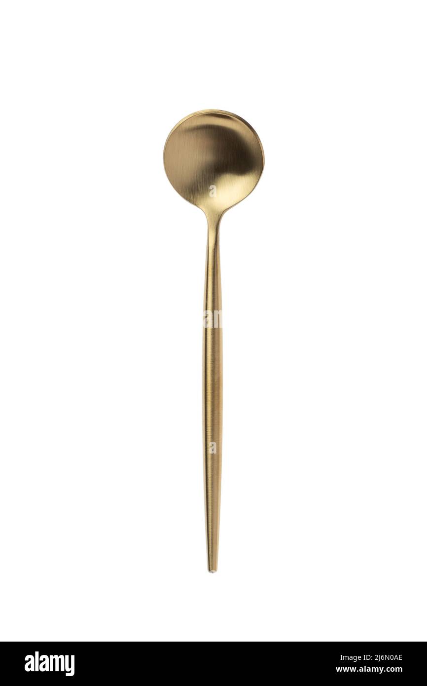 Small round golden spoon isolated on a white background. Top view
