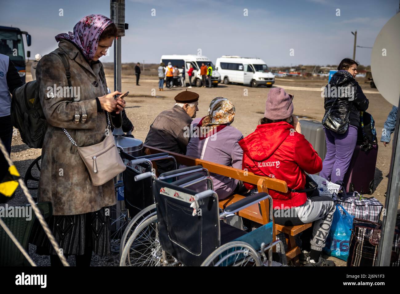 Ukrainian refugees have reached the border with Moldova in Palanka. From here they are taken by small buses to a collection point where they are provided with drinks and food. Coaches then take the refugees to Romania and other European host countries. Stock Photo