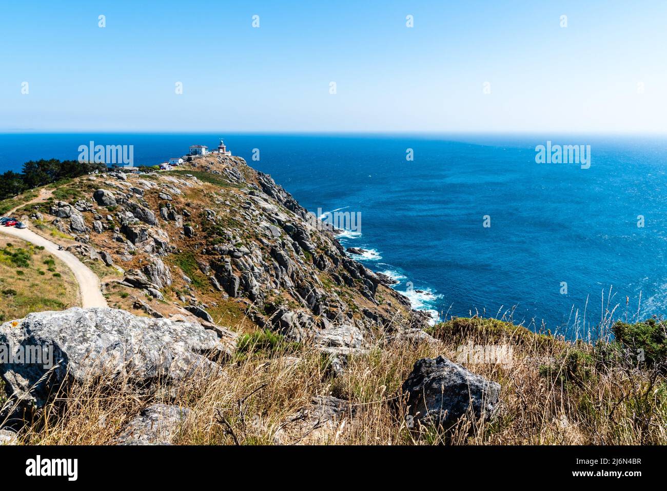 View of Cape Finisterre Lighthouse at Costa da Morte or Death Coast at Fisterra, Coruna, Spain. Stock Photo