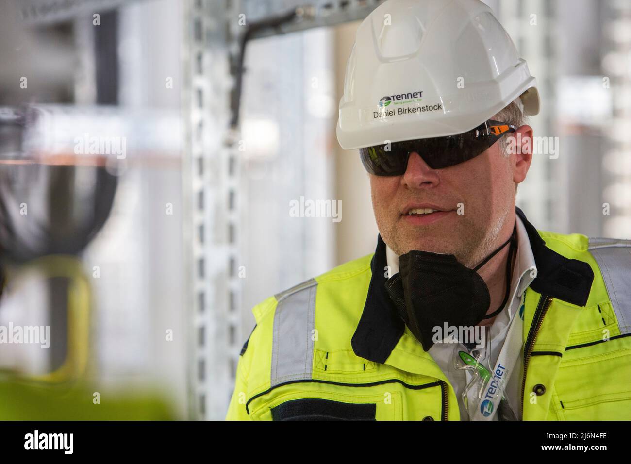 PRODUCTION - 25 April 2022, Spain, Cadiz: Daniel Birkenstock, overall  project manager DolWin6 at TenneT, speaks during the visit to the DolWin  kappa offshore converter platform, which is being built at the