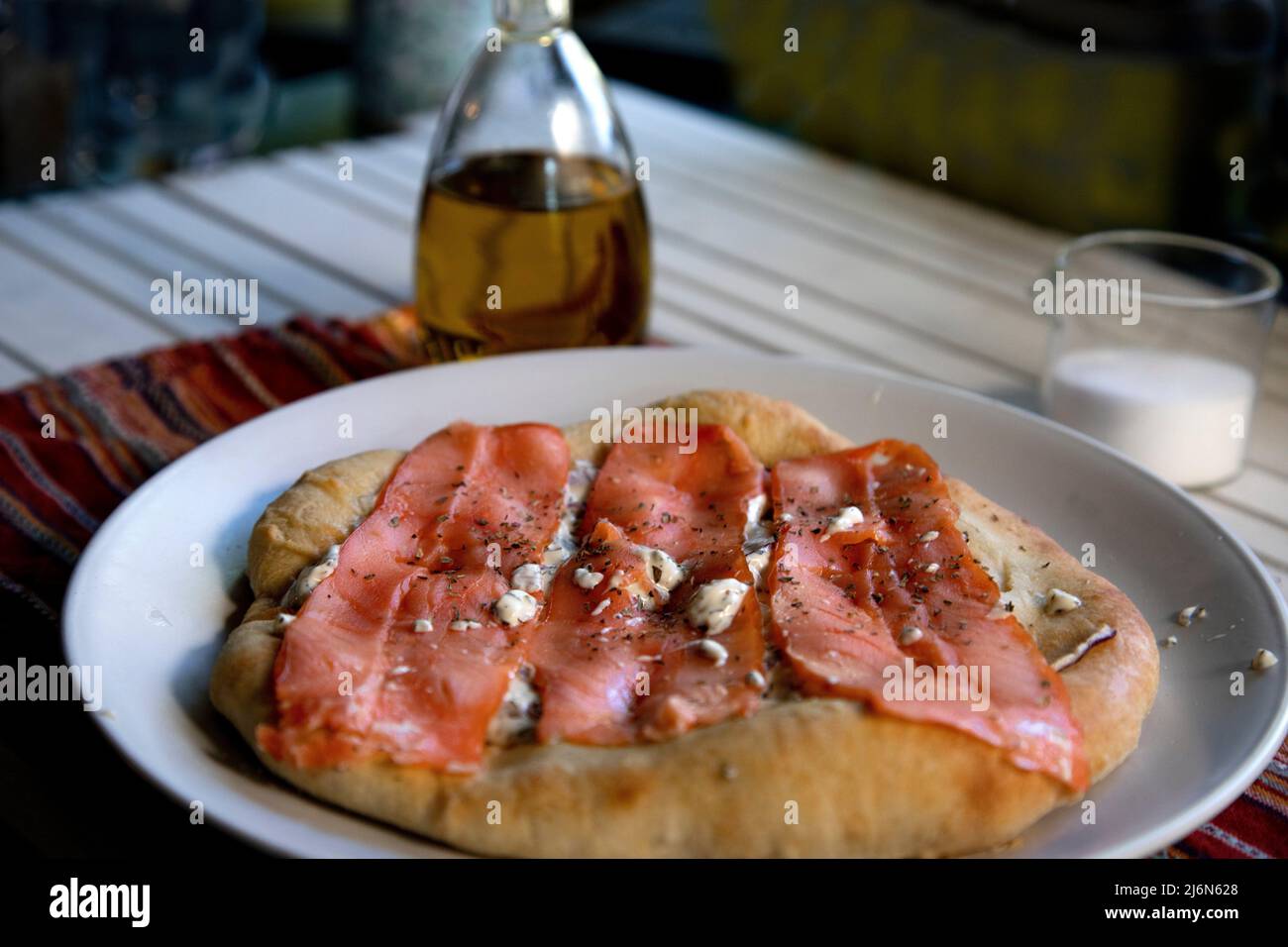 Side view od smoked salmon pizza. Stock Photo