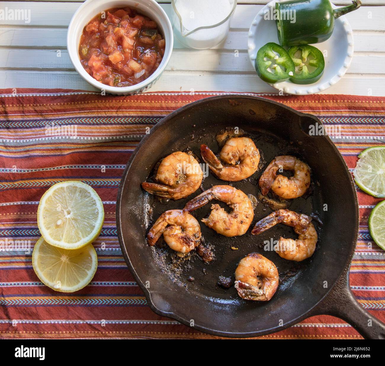 Top View of Shrimp Cooked in a cast-iron skillet. Stock Photo