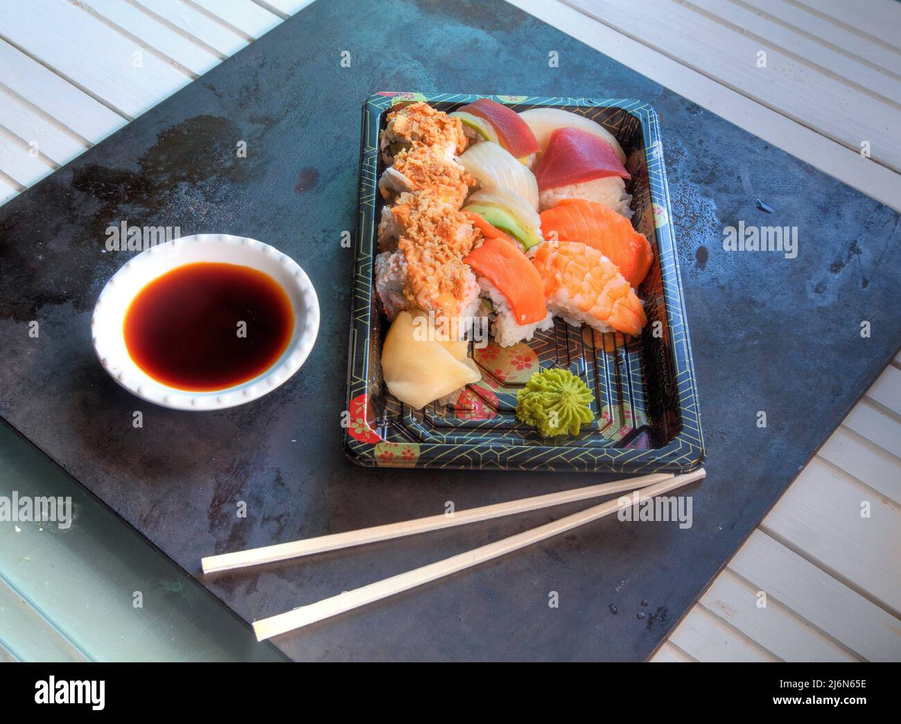 Top view of Sushi Platter on daek metal surface. Stock Photo