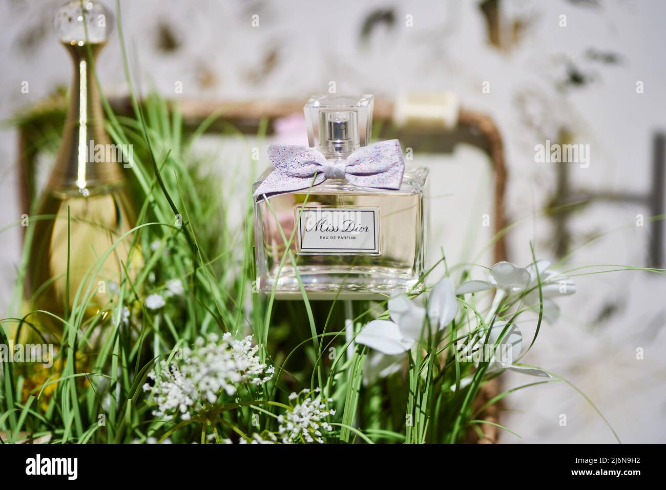 Miss Dior, Eau de Parfum, perfume bottle with ribbon Stock Photo