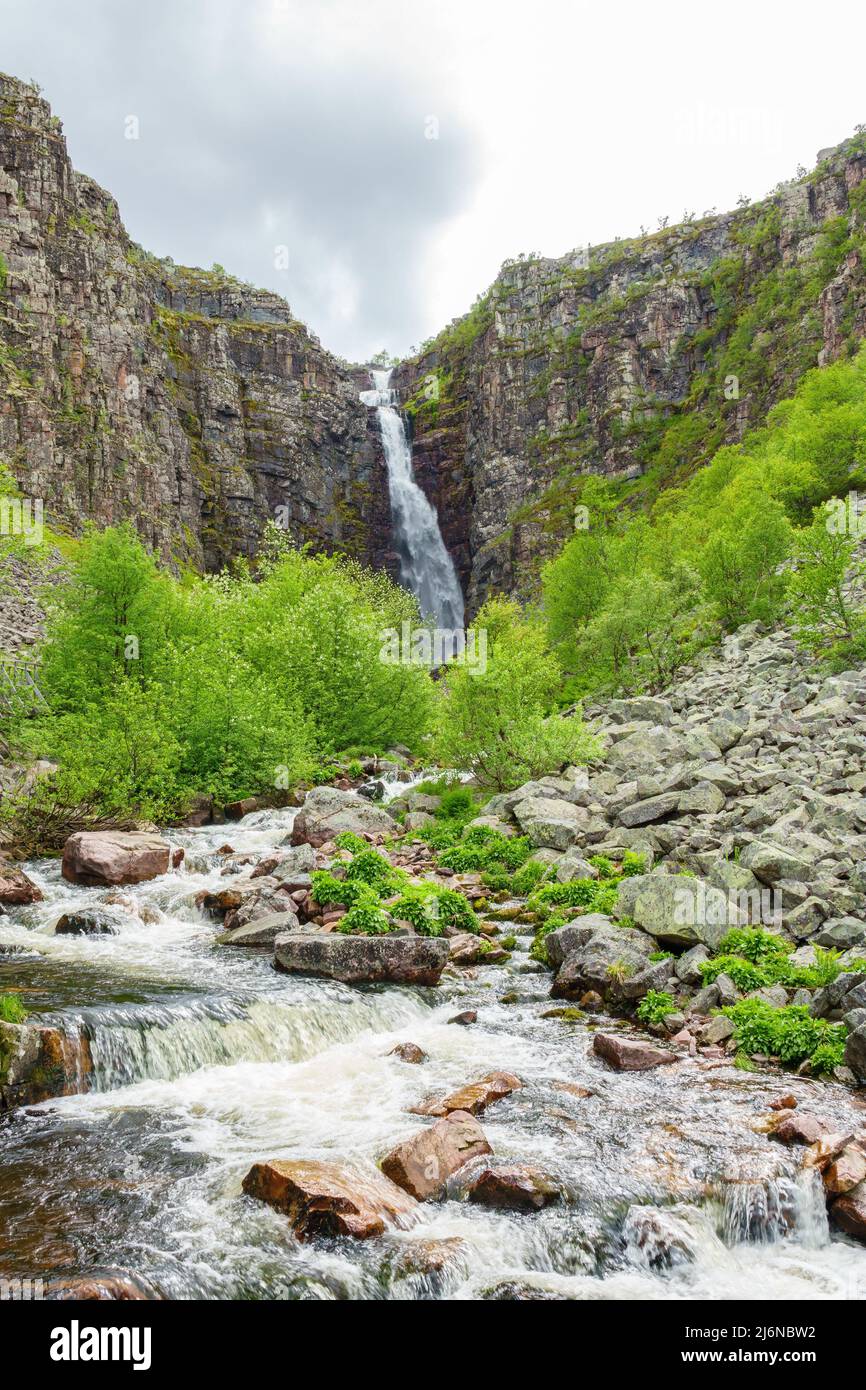 Stream of water and a waterfall on the mountain side Stock Photo - Alamy