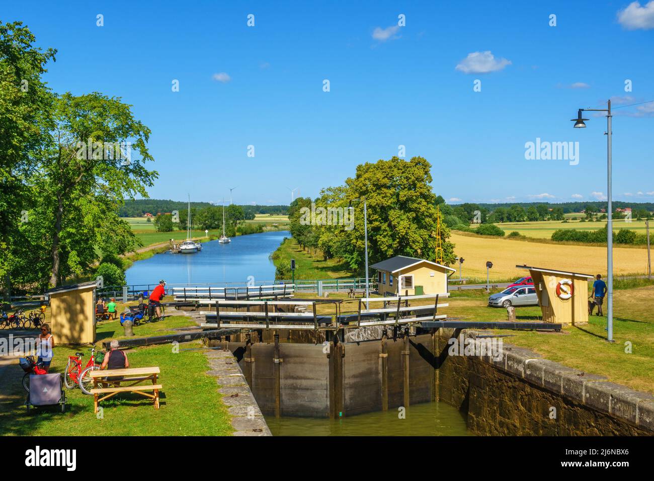 Lock gates on the Gota channel with a rural landscape view Stock Photo