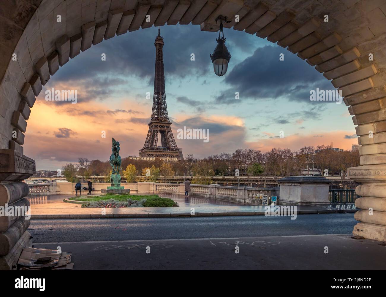 Paris, France - November 19, 2020: Eiffel tower seen from arch of Bir Hakeim bridge in Paris Stock Photo
