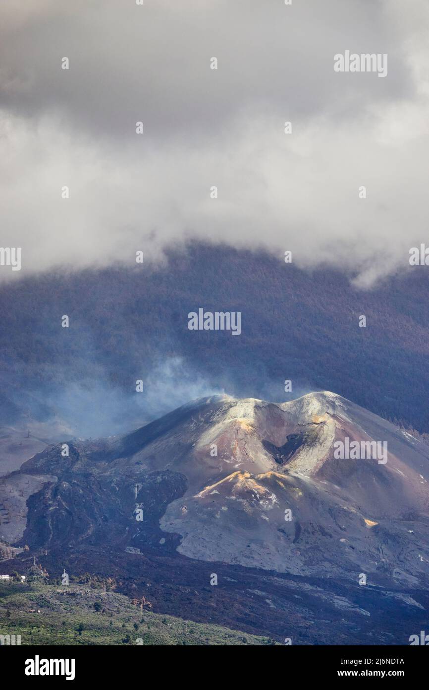 Sunbeam Illuminates Smoking Nameless Volcanic Crater. Sulfur Deposits And Black Magma Flows. El Paso La Palma Canary Islands Spain Stock Photo
