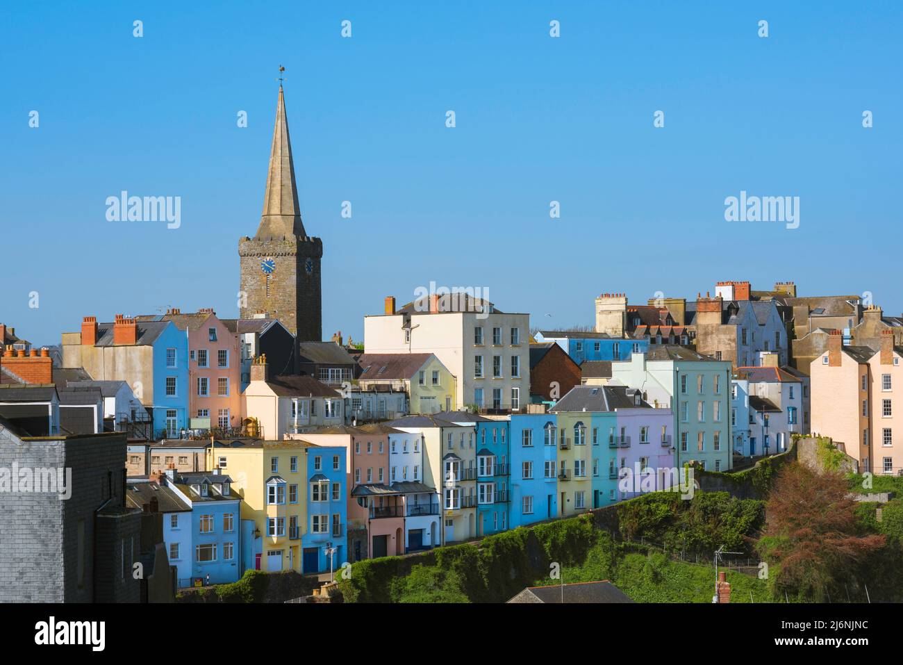 Pembrokeshire property, view of colourful houses lining Crackwell Street in the historic harbour area of Tenby, Pembrokeshire, Wales Stock Photo
