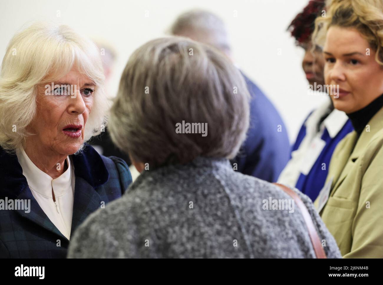 The Duchess of Cornwall meets survivors and guests at a reception while attending the I Am photography exhibition, a new collection of portraits of survivors of domestic abuse by award-winning photographer Allie Crew, at Manchester Central Library during a visit to Greater Manchester. Picture date: Tuesday May 3, 2022. Stock Photo