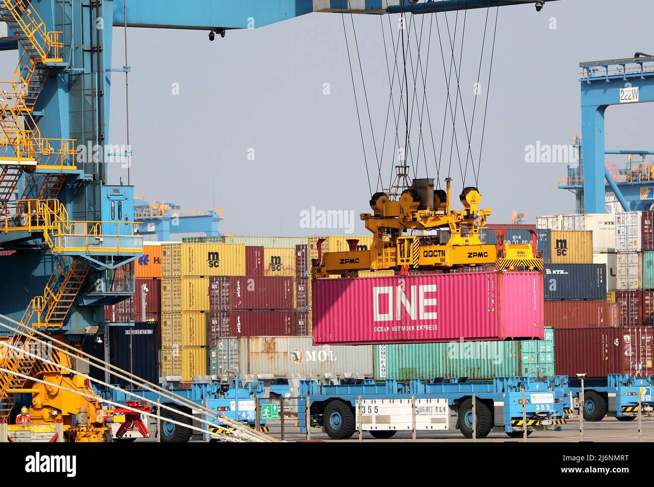 QINGDAO, CHINA - MAY 3, 2022 - An automatic guided vehicle delivers goods at a fully automated terminal in Qingdao, East China's Shandong Province, Ma Stock Photo