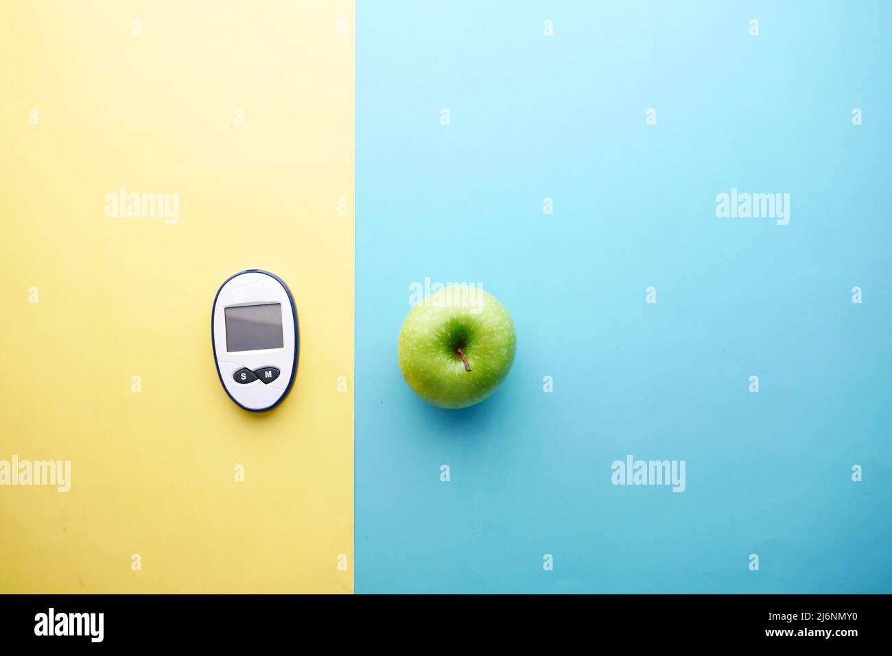 diabetic measurement tools, apple on table Stock Photo Alamy