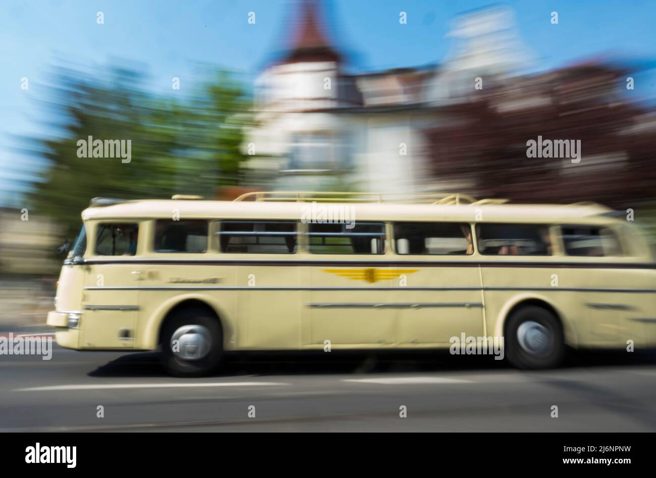 03 May 2022, Saxony, Dresden: An 'Ikarus 66' bus drives through the city. The bus was built in the Hungarian Ikarus factories in 1972, has 190 hp and was on regular service in Dresden until 1985. A total of 3 historic buses of the Historische Kraftfahrzeuge des Dresdner Nahverkehrs e. V. are on the road in Dresden this week on the occasion of the 20th anniversary of the association. Photo: Matthias Rietschel/dpa-Zentralbild/dpa Stock Photo