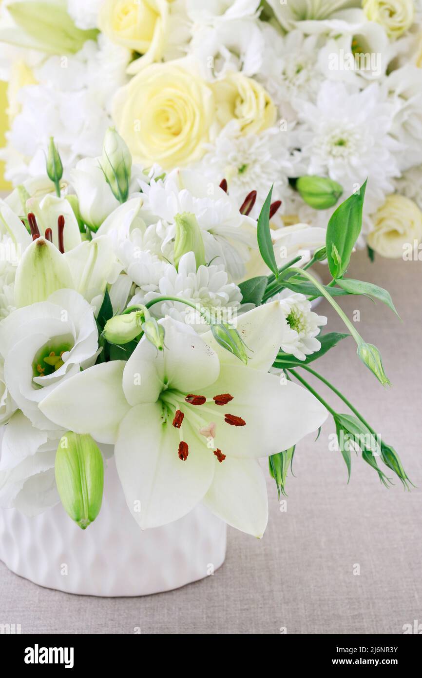 Luxurious floral arrangement with lilies, roses, eustoma, chrysanthemum