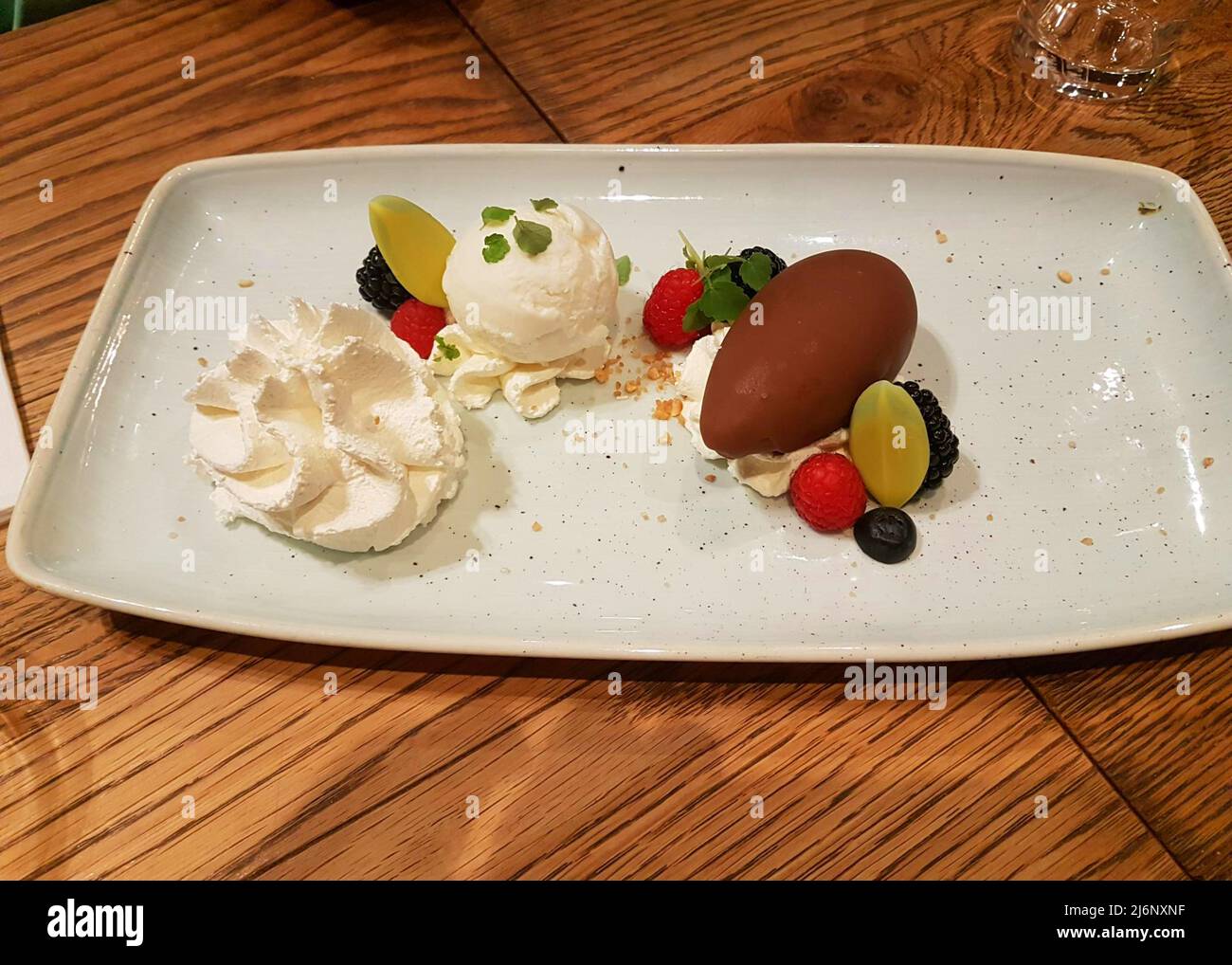 Summer sorbet dessert with coconut sorbet ice cream, pineapple sorbet