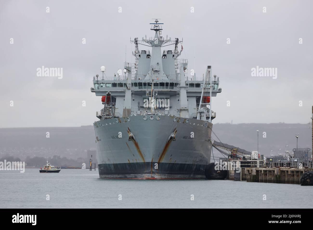 The Royal Fleet Auxiliary fast fleet tanker WAVE KNIGHT berthed on Victory Jetty in the Naval Base Stock Photo