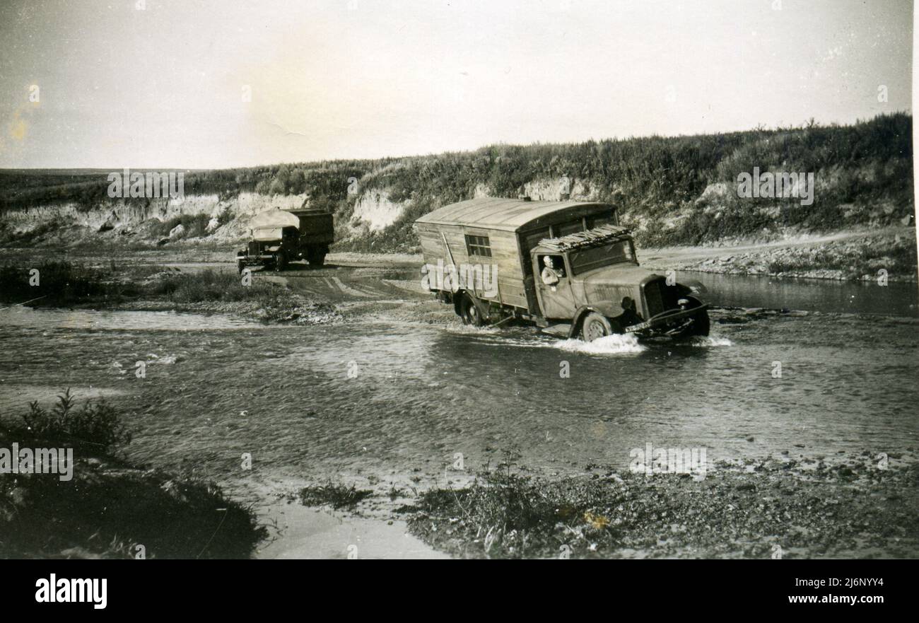 WWII WW2 german soldiers invades URSS - 25 august 1942, wehrmacht - Operation Barbarossa - german truck crossing Weduga river near Voronezh Stock Photo