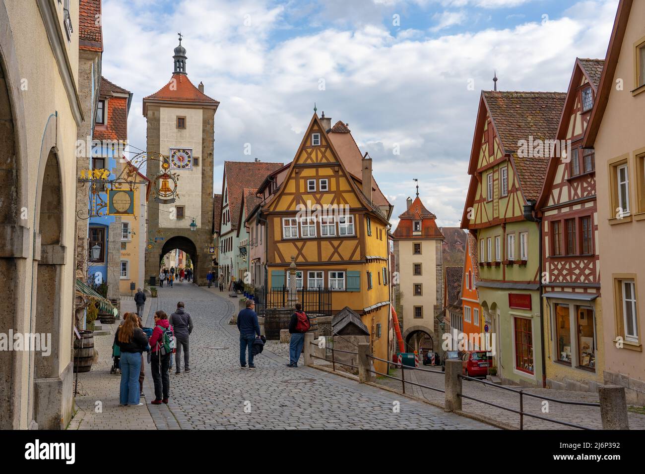 Rothenburg ob der Tauber, Bavaria, Germany - 04.11.2022: beautiful architecture of romantic Rothenburg ob der Tauber with colorful medival houses in B Stock Photo