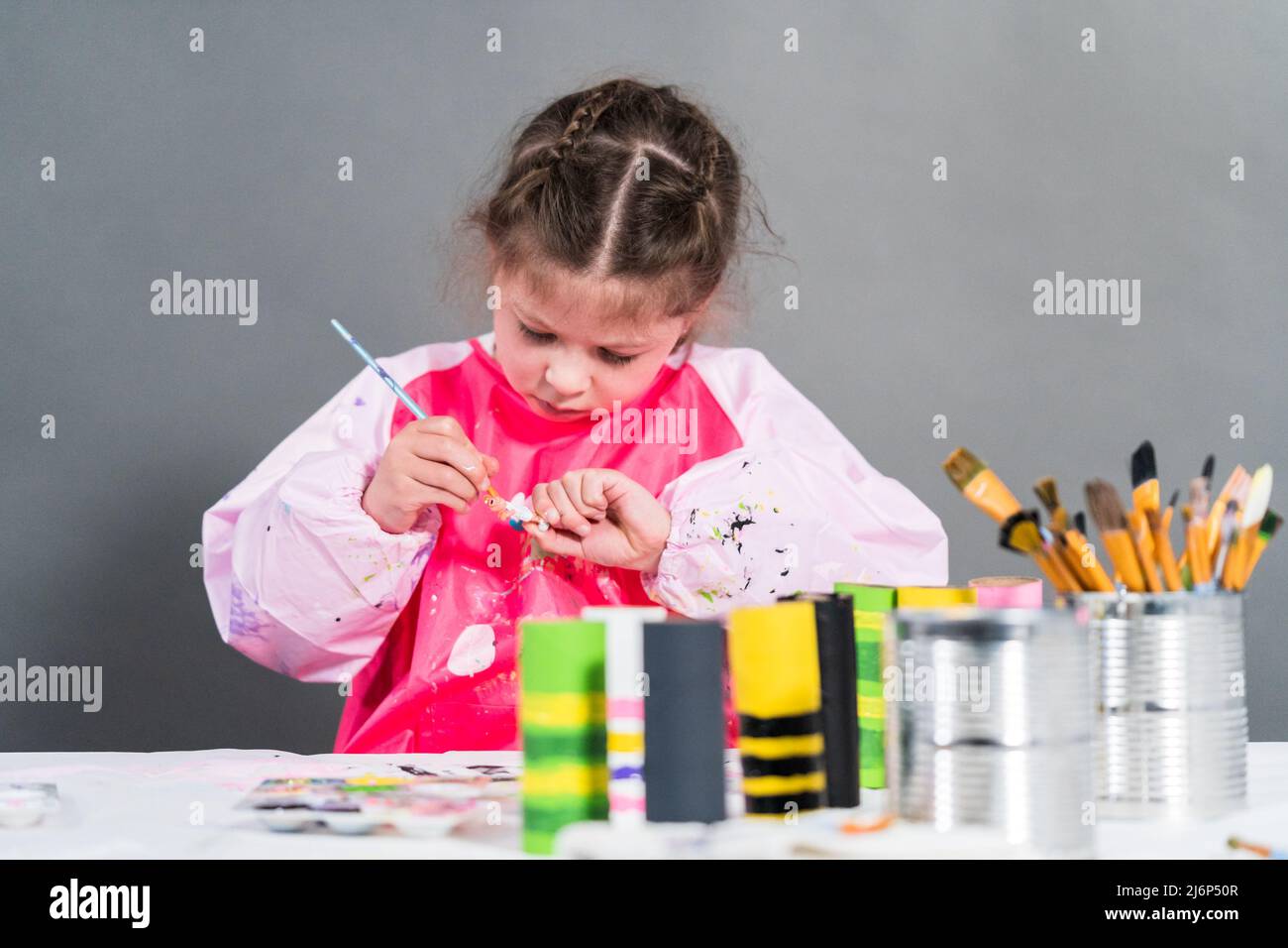 Making different bugs out of empty toilet paper rolls during