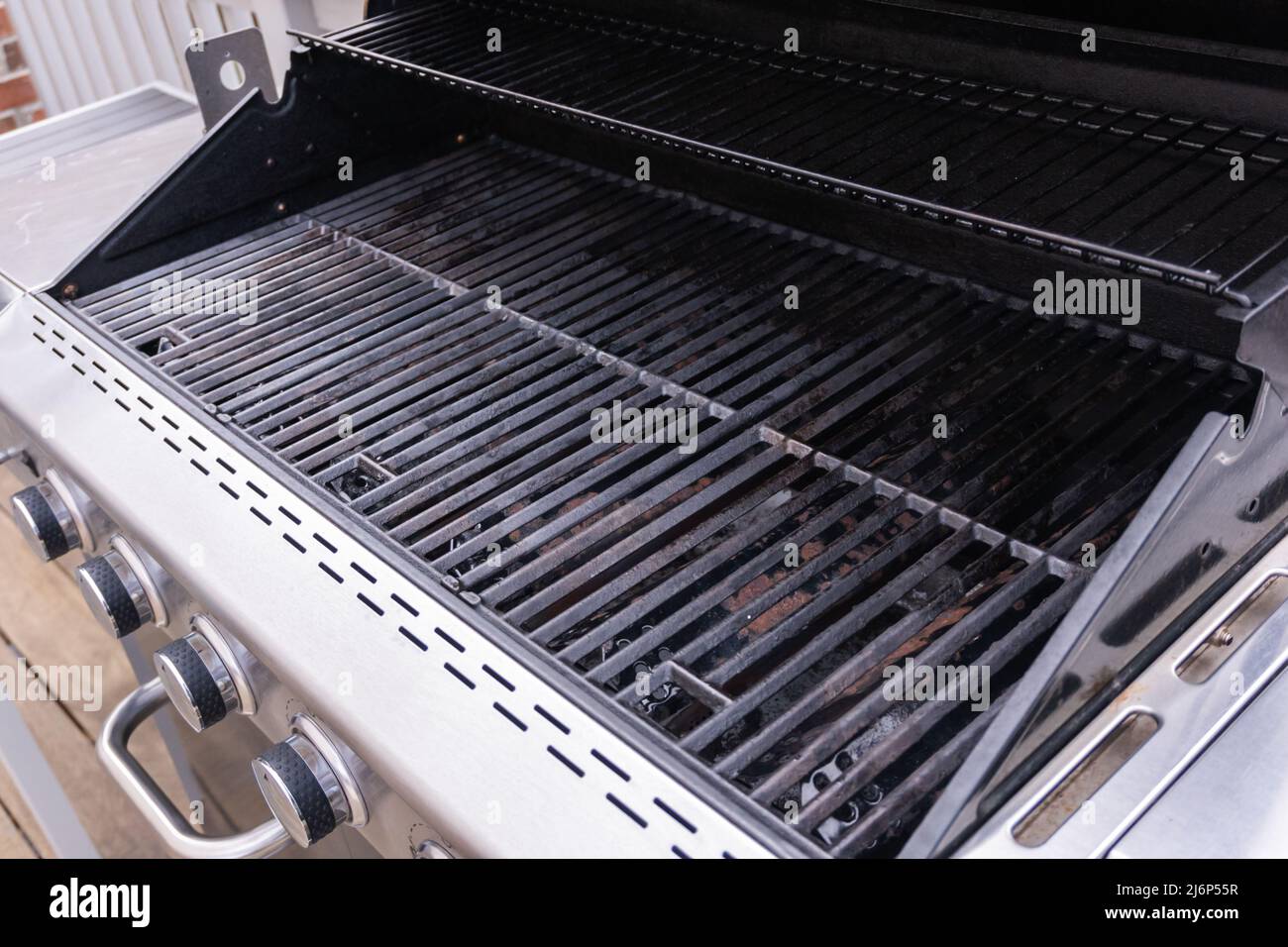 Clean sixburner gas grill ready for summer grilling Stock Photo Alamy