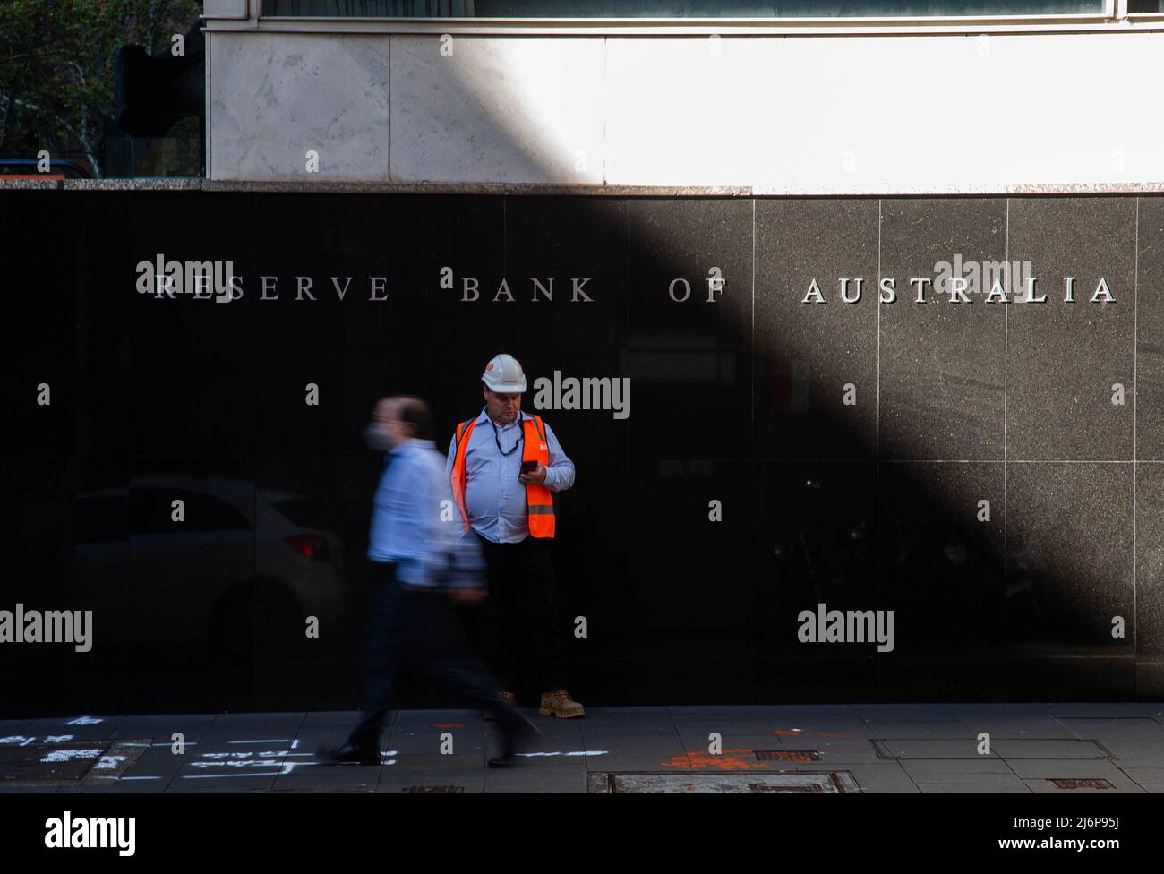 (220503) -- SYDNEY, May 3, 2022 (Xinhua) -- People are seen in front of the Reserve Bank of Australia (RBA) in Sydney, Australia, on May 3, 2022. After dropping interest rates down to historic low levels during the pandemic, the RBA has lifted interest rates by 0.25 to 0.35 percent, the first rise since 2010, in an effort to calm growing inflation. (Photo by Hu Jingchen/Xinhua) Stock Photo