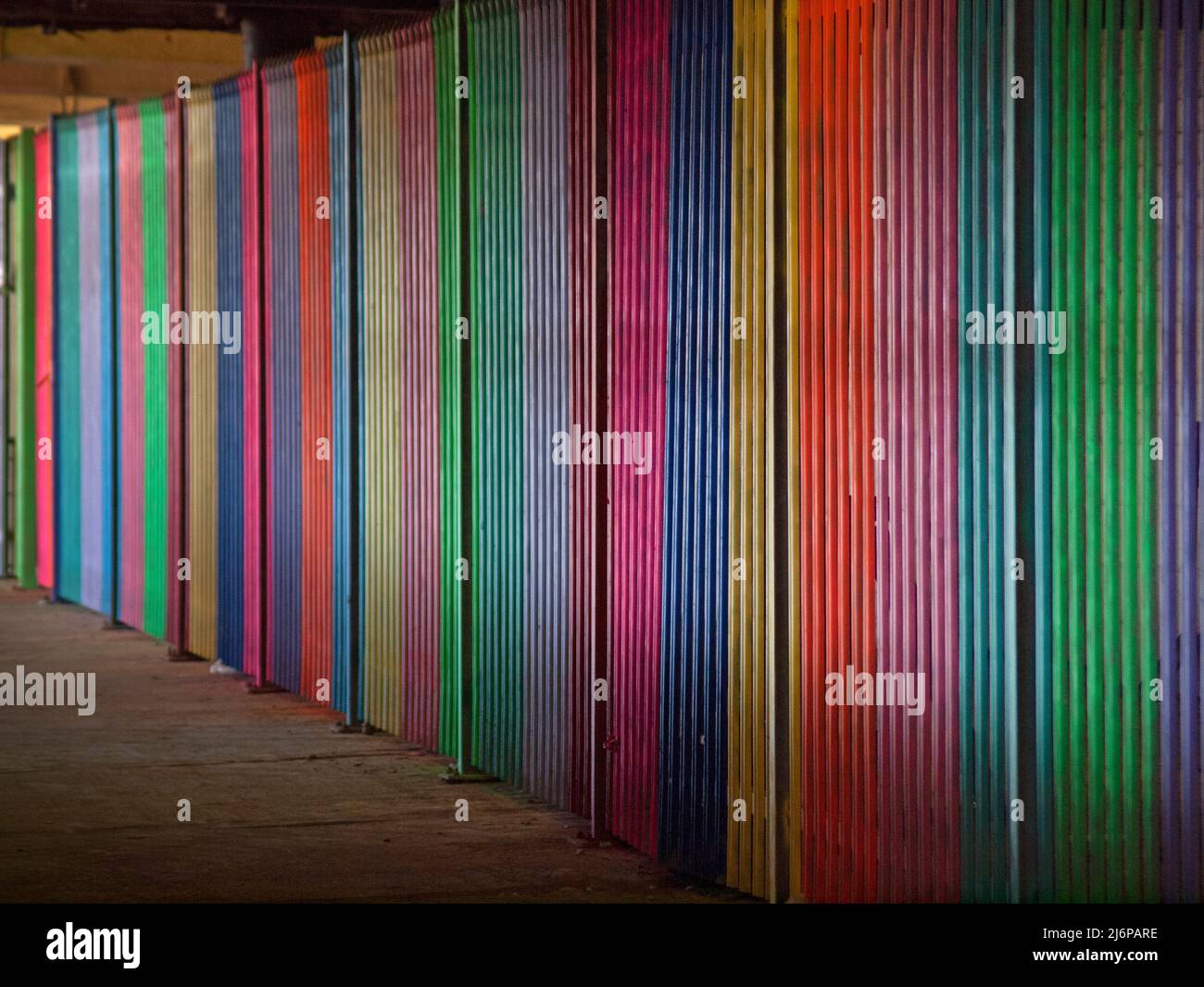 Coloufully painted railings in Brighton, England Stock Photo