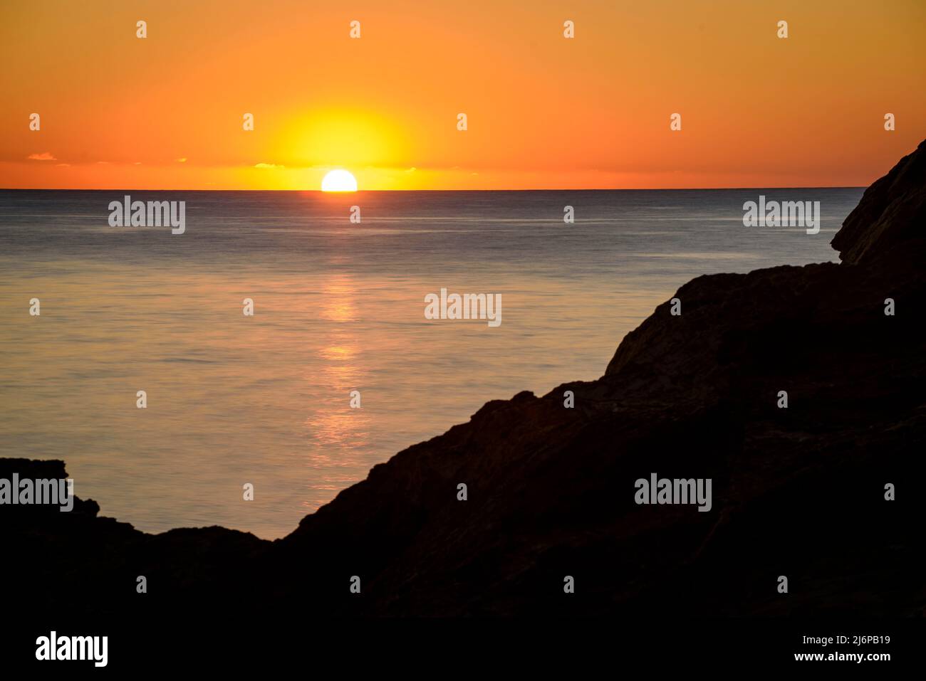 The first sunrise of the year seen from Cadaqués, in Cap de Creus (Empordà, Costa Brava, Gerona, Catalonia, Spain) ESP: El primer amanecer en Cadaqués Stock Photo