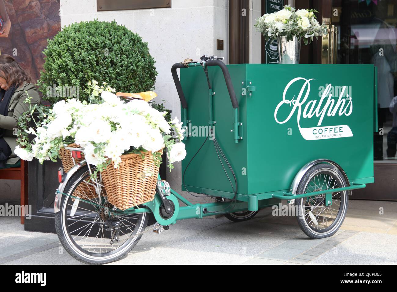 Ralph Lauren coffee shop bicycle, a cup of Ralph's Coffee on Bond Street,  London, England, UK, 2022 daytime Stock Photo - Alamy