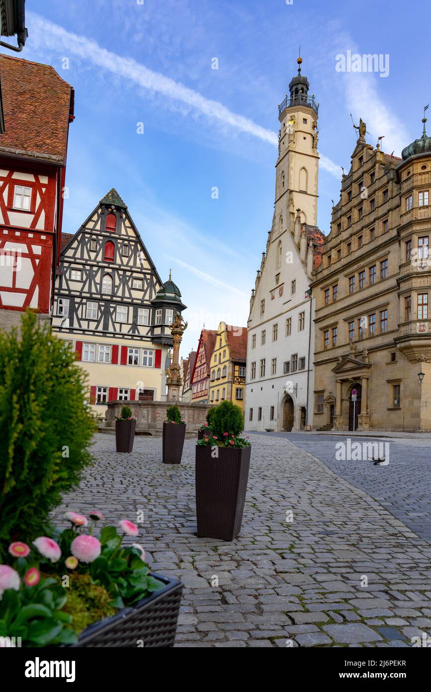 beautiful architecture of romantic Rothenburg ob der Tauber with colorful medival houses in Bavaria Germany with flowers . Stock Photo