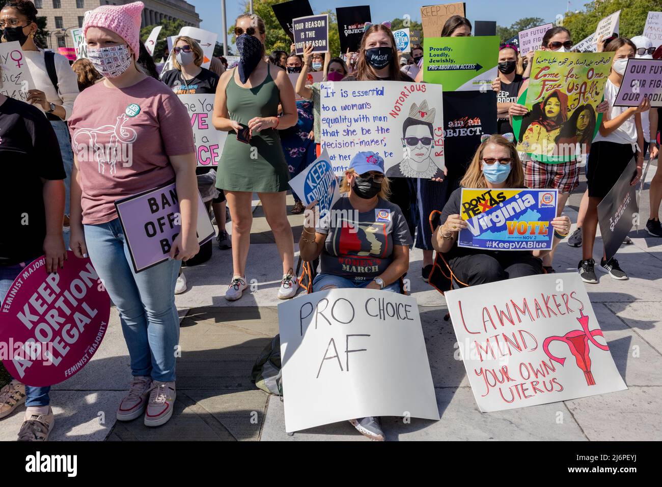 WASHINGTON, D.C. – October 2, 2021: Demonstrators rally in Washington, D.C.’s Freedom Plaza during the 2021 Women’s March. Stock Photo