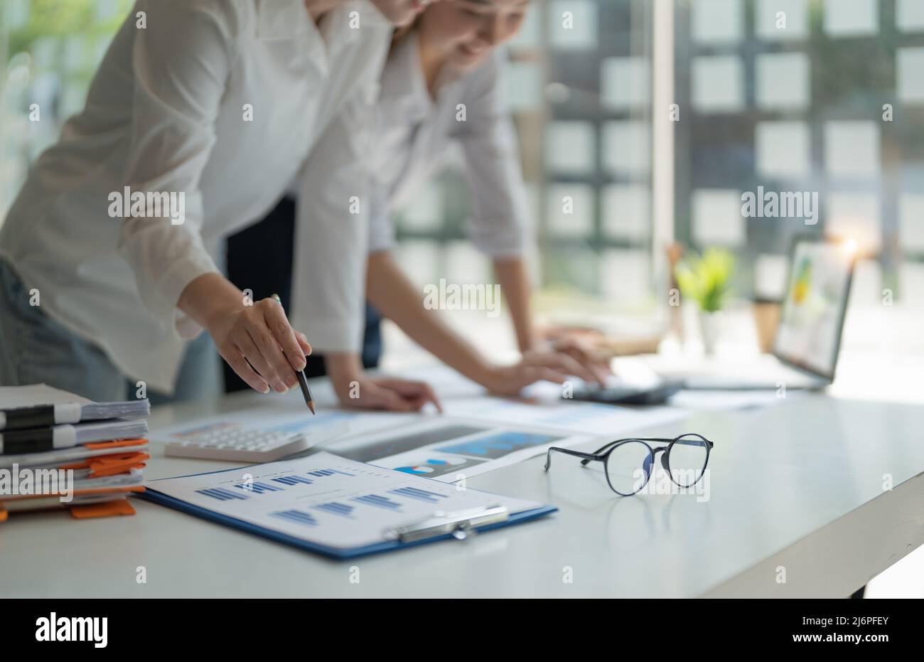 Business people are meeting discussion for analysis data figures to plan business strategies. Business discussing startup concept Stock Photo