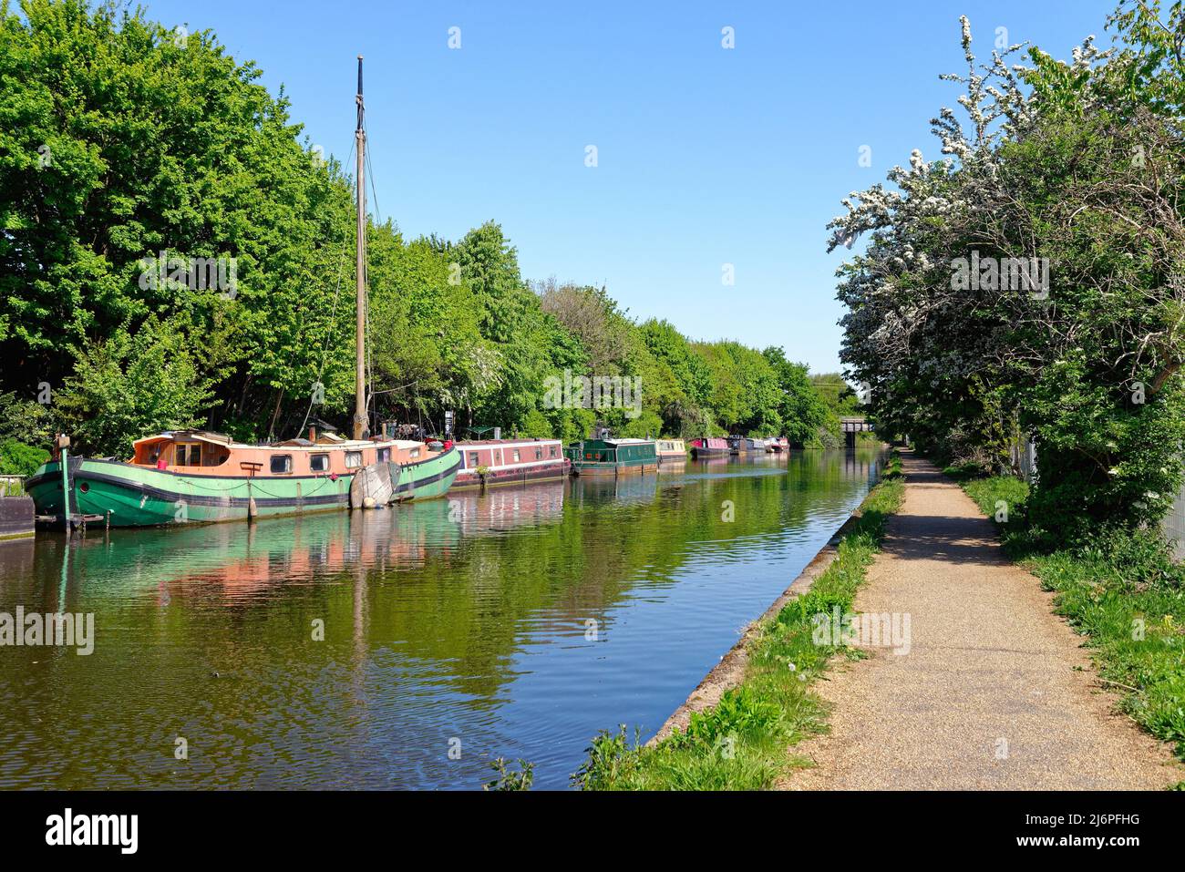 The Paddington branch of the Grand Union Canal with moored houseboats, at Hayes Greater London England UK Stock Photo