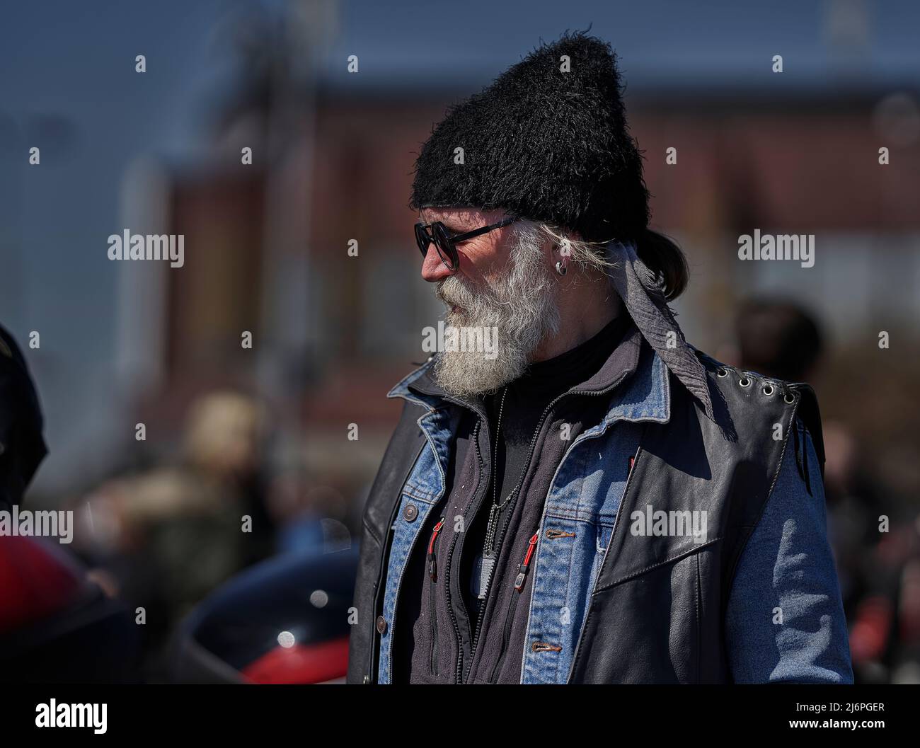 30-04-2022 Riga, Latvia Fashion portrait of bearded man in hat ready for road trip Stock Photo