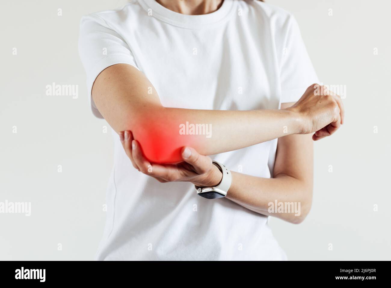 Arm pain and injury for woman. Closeup side body with painful elbow