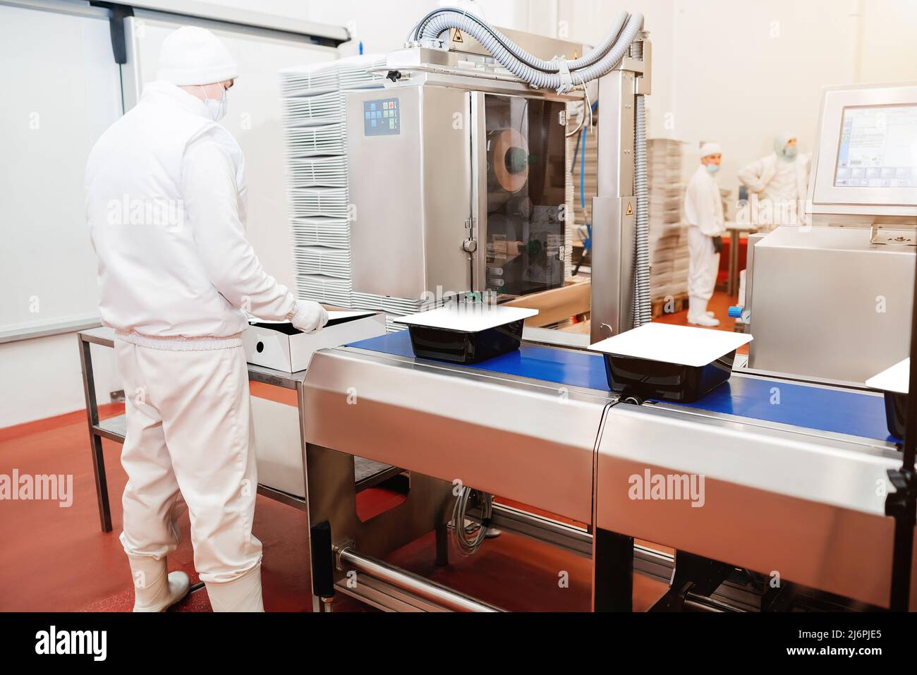 Factory Cook Conveyor Belt Food.Automated production line in modern food factory ...