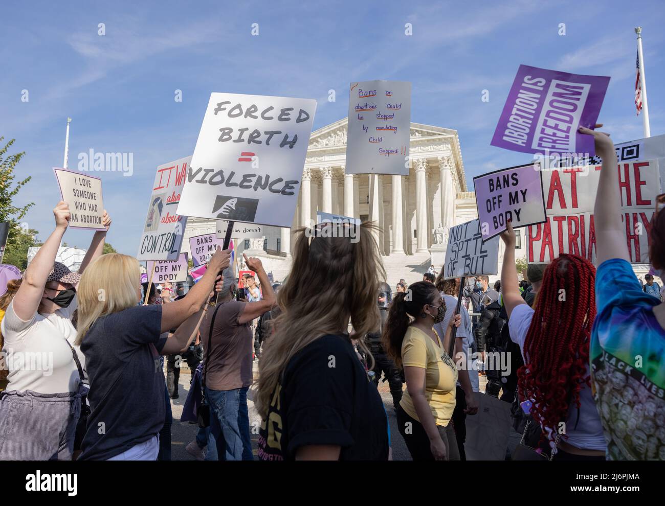 WASHINGTON, D.C. – October 2, 2021: Demonstrators participating in the 2021 Women’s March protest near the United States Supreme Court. Stock Photo