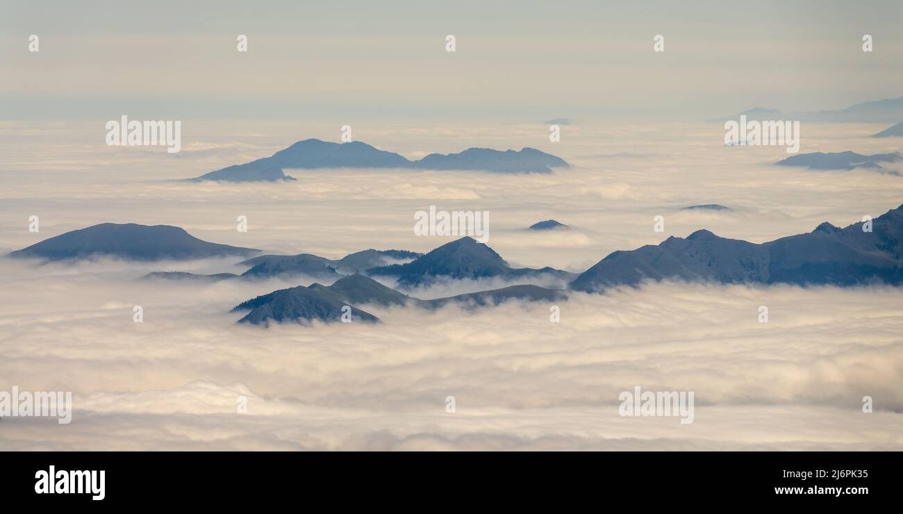 Mountain peaks above the  clouds. View from the Pic du Midi de Bigorre in the Pyrenees, France Stock Photo