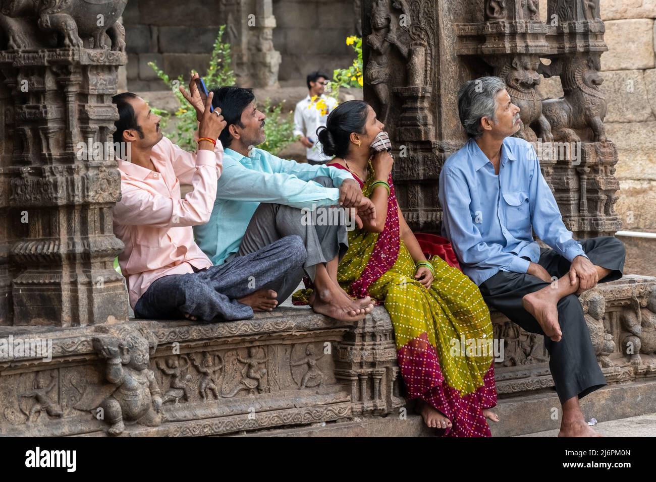 Vellore, Tamil Nadu, India - September 2018: A group of Indian tourists sightseeing at the ancient Jalakandeswarar temple in the Vellore fort. Stock Photo