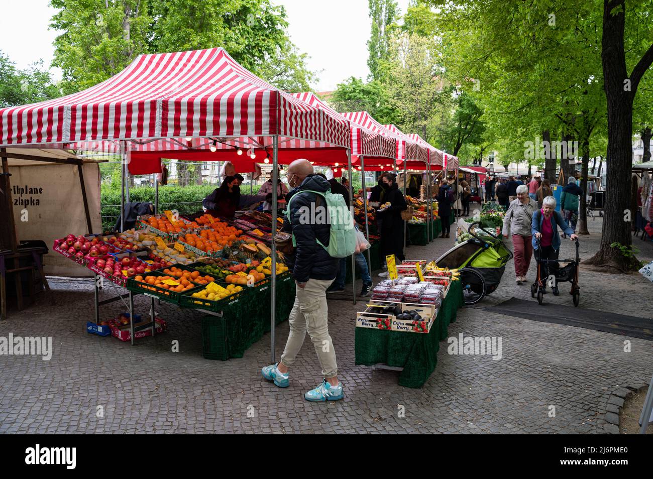 German Spring Market 30.04.2022, Berlin, Germany, Europe - People shop on a spring day at ...