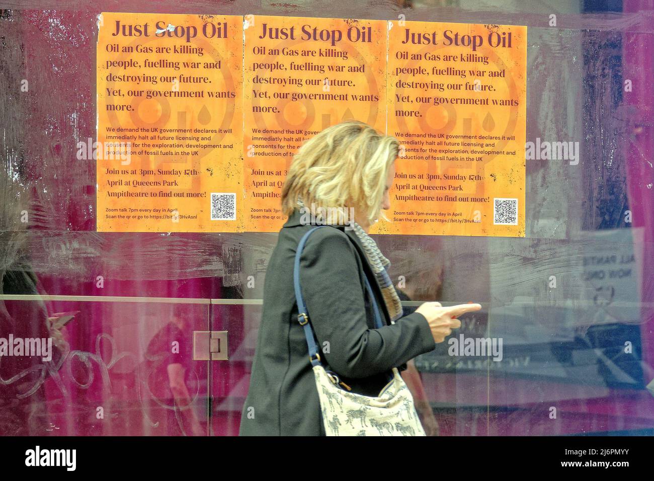 Glasgow, Scotland, UK 3rd May, 2022. just stop oil posters, The lack of good newspaper protest and a growing discontent has seen an increasing presence on the street of protest from graffiti to stickers attempting to find an audience as they are seeing no presence in the media . Credit Gerard Ferry/Alamy Live News Stock Photo