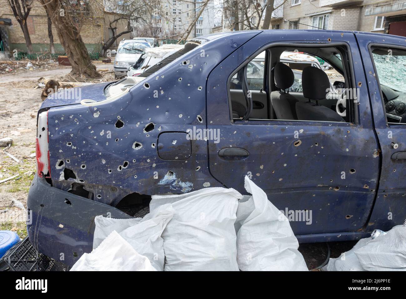 War of Russia against Ukraine. Civilian cars shot. Stock Photo