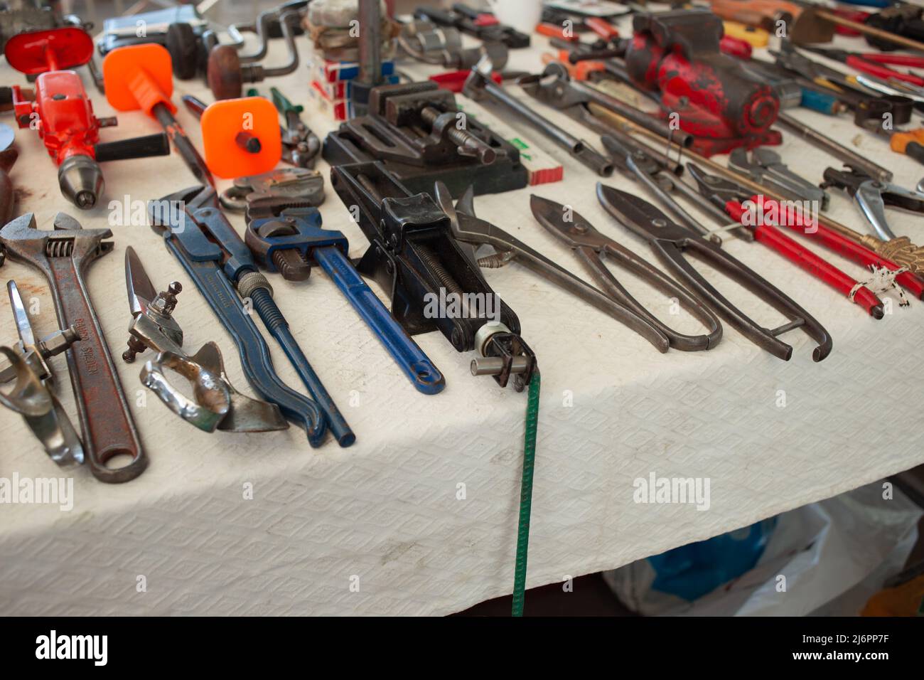 Old metal tools wrench, key, pliers at flea market in Bodrum, Turkey. Stock Photo