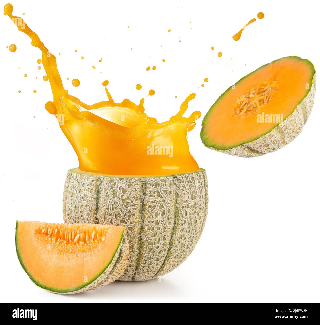 orange juice splashing out of a melon isolated on white Stock Photo