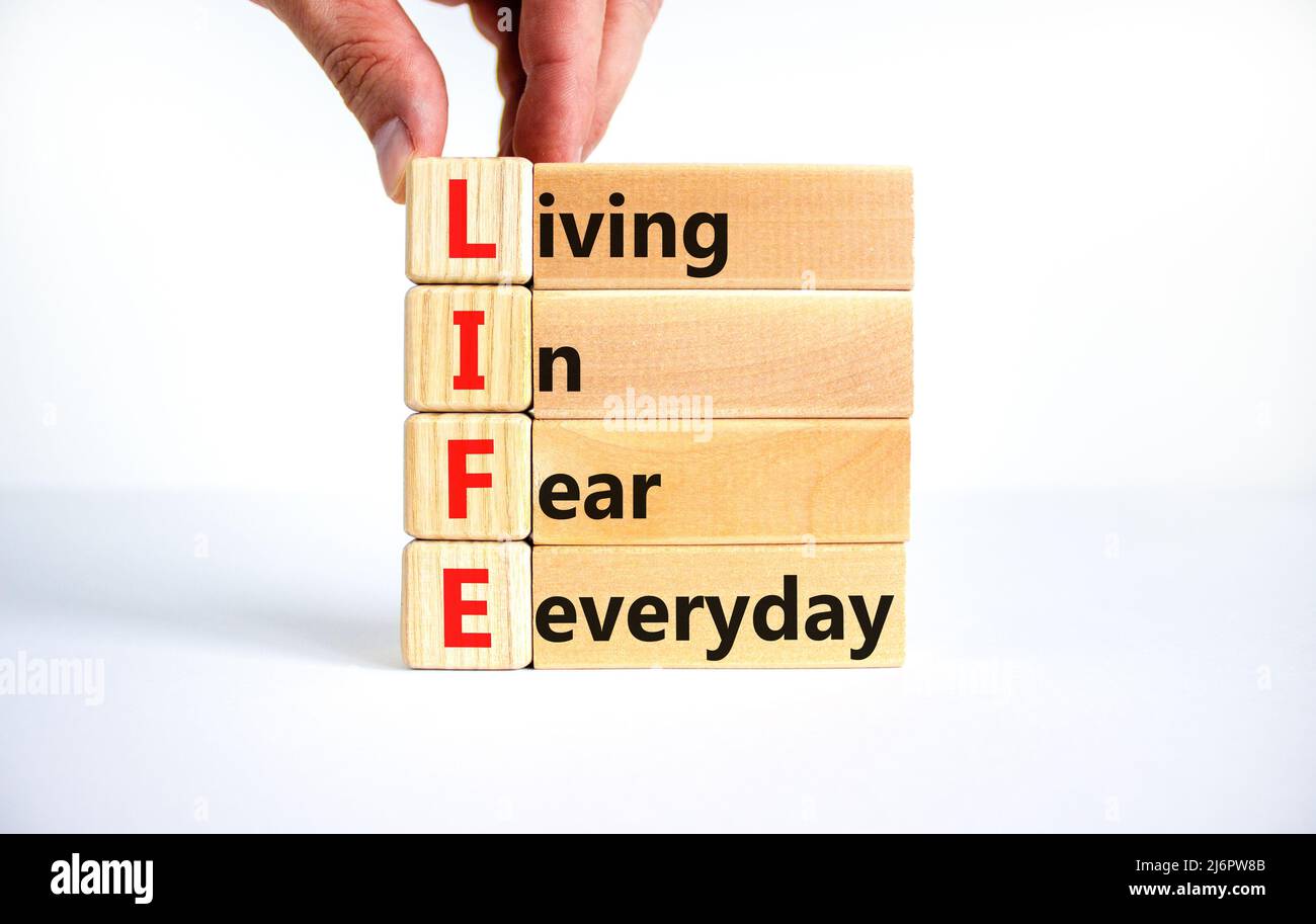 LIFE living in fear everyday symbol. Concept words LIFE living in fear