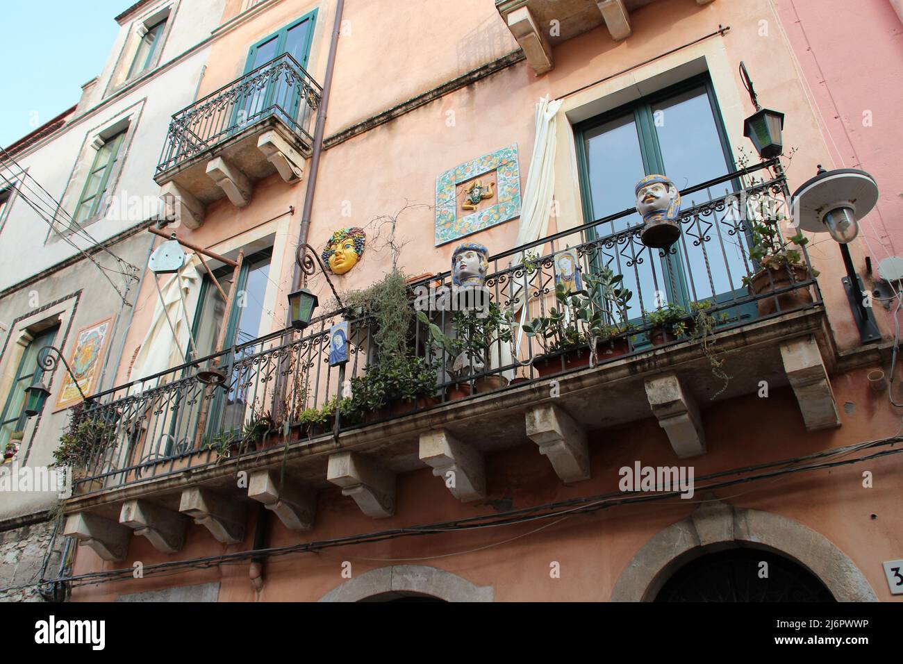 house or ancient flat building in taormina in sicily (italy Stock Photo