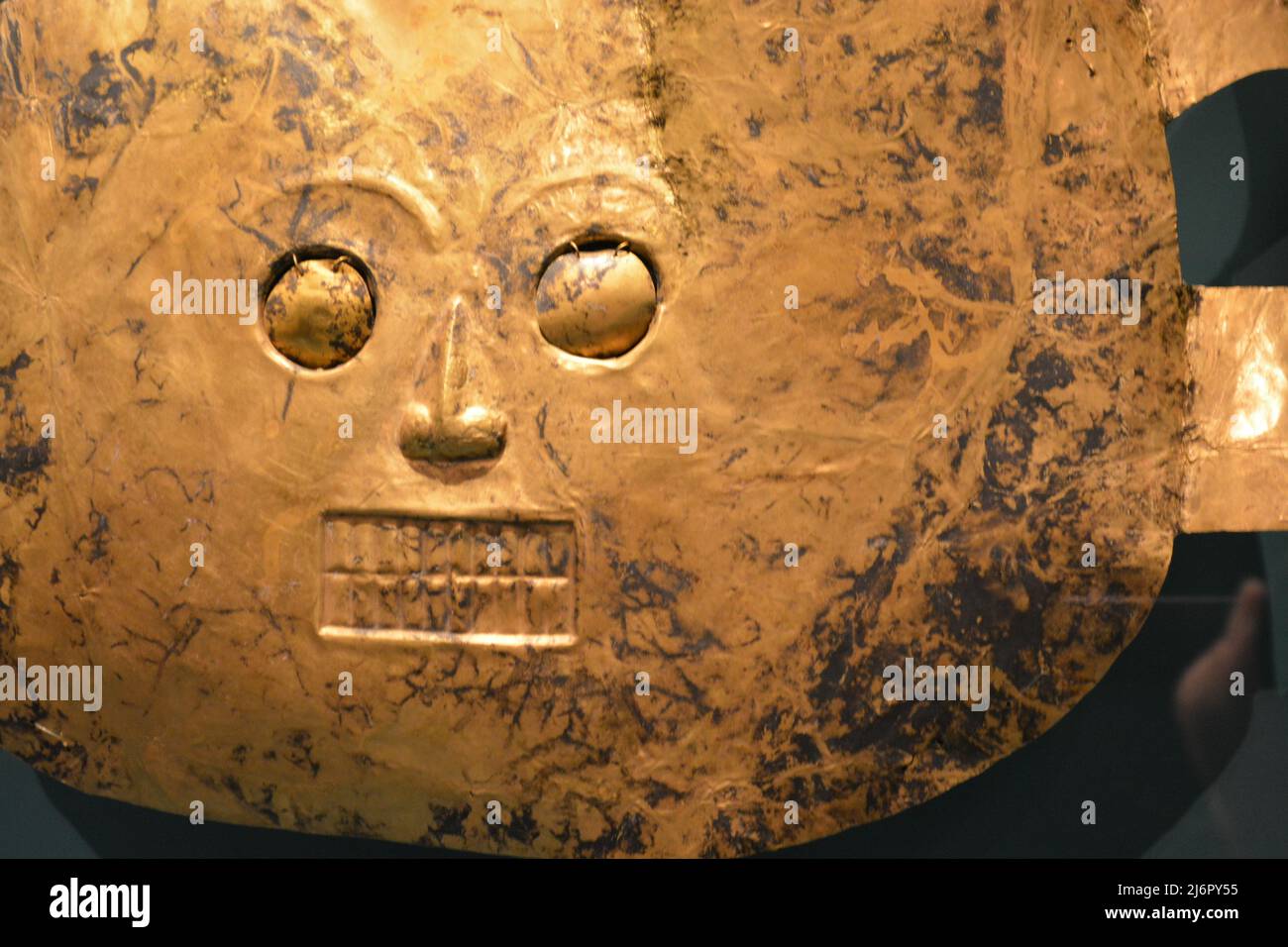 Precolumbian Gold Mask found in Colombia. Museum of Fine Arts Houston Texas Stock Photo