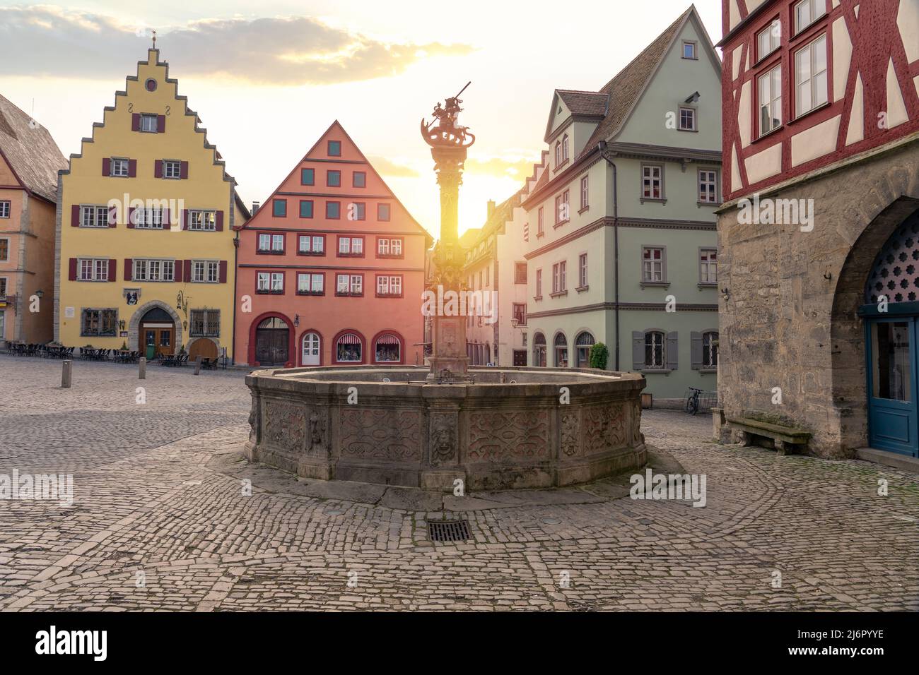 morning with sunrise in Rothenburg ob der Tauber with colorful houses of market square Stock Photo