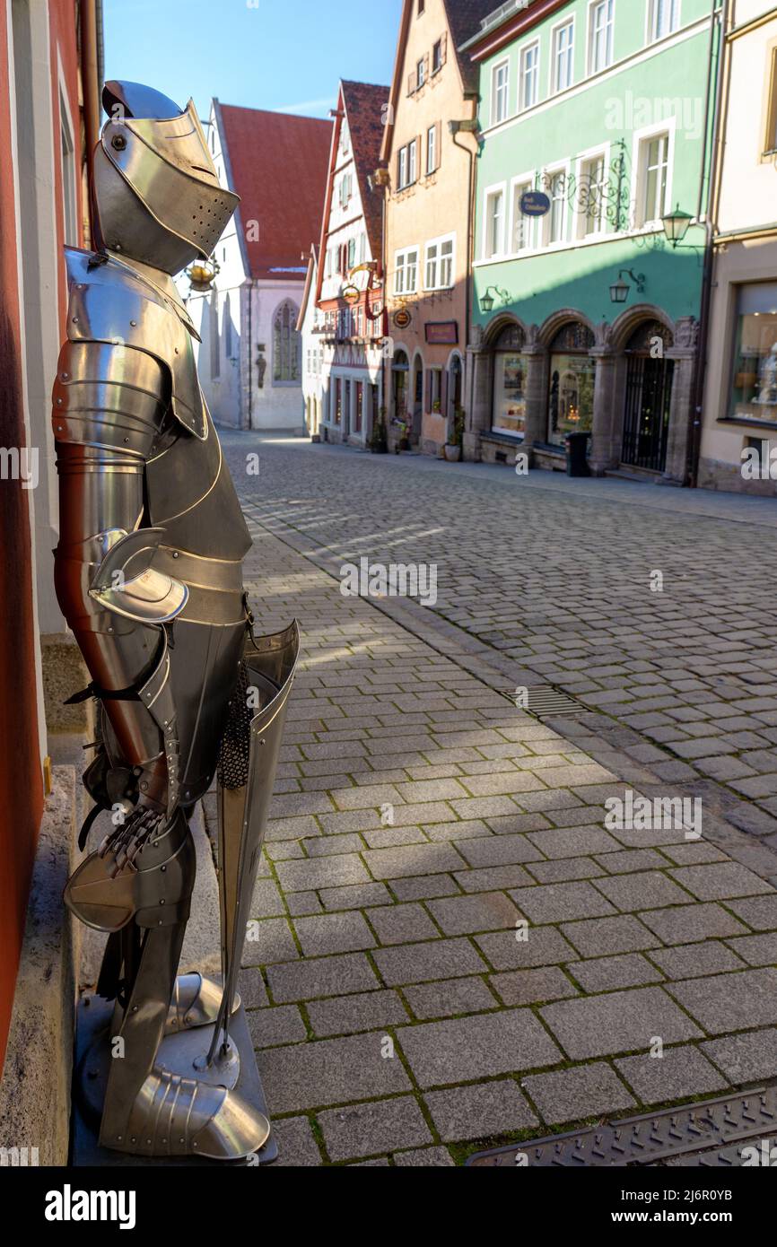 knight armor in Rothenburg ob der Tauber on the colorful middle age street . Stock Photo
