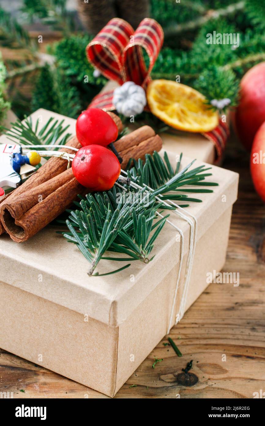 Wrapping christmas presents. Festive time Stock Photo Alamy