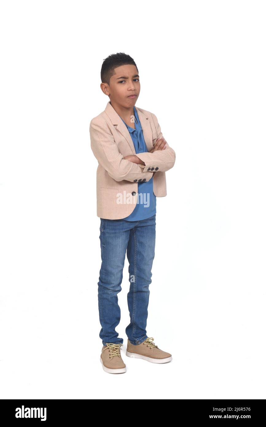 angry boy with crossed arms and looking at camera Stock Photo - Alamy